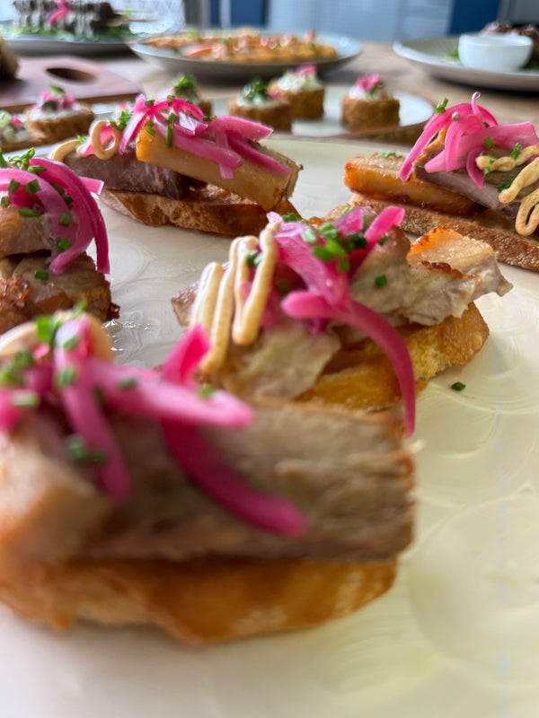 Grilled Pork Belly, Pickled Shallots, Chipotle Aioli on Crostini