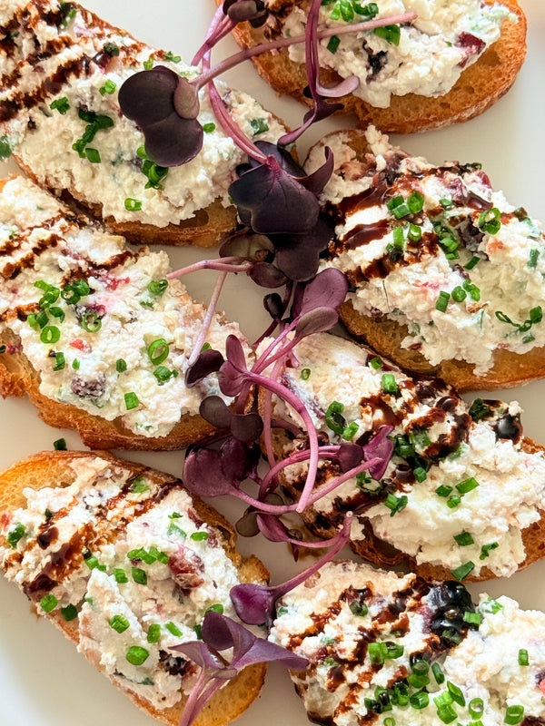 Goat Cheese Feta with Cranberry, Walnut and Chives on a Crouton