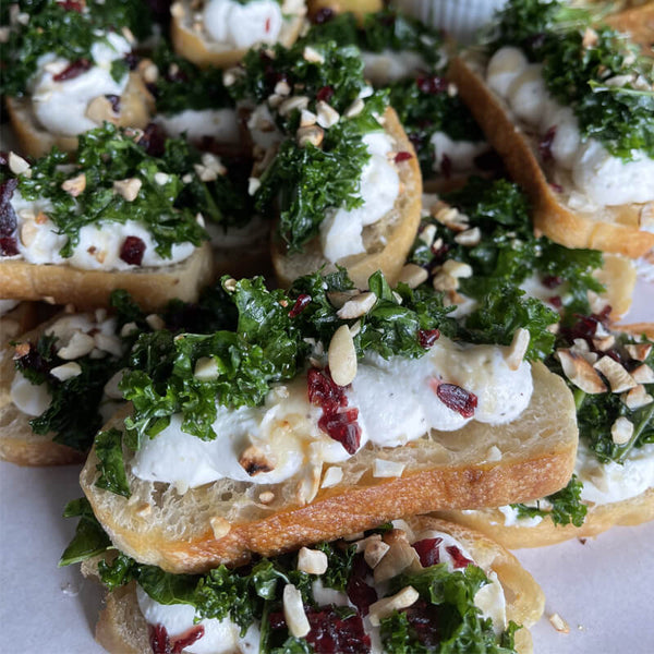 Ricotta, Honey, Kale, Pine Nuts on a Toasted Baguette